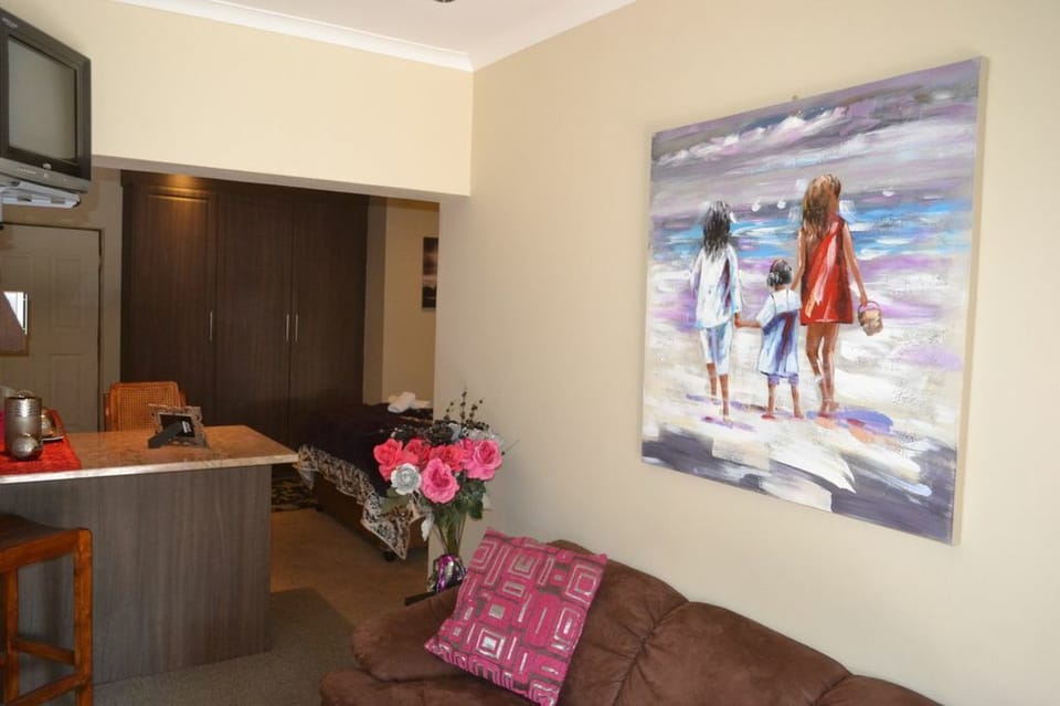 Family Room, 1 Bedroom | Living area | TV