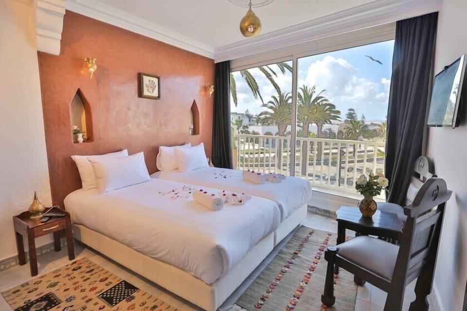 Deluxe Studio, 2 Twin Beds, Smoking, Sea View | Premium bedding, blackout drapes, free cribs/infant beds, free WiFi