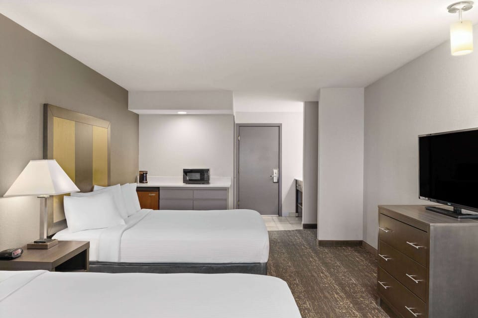 Room, 2 Queen Beds, Non Smoking | Pillowtop beds, individually furnished, desk, laptop workspace