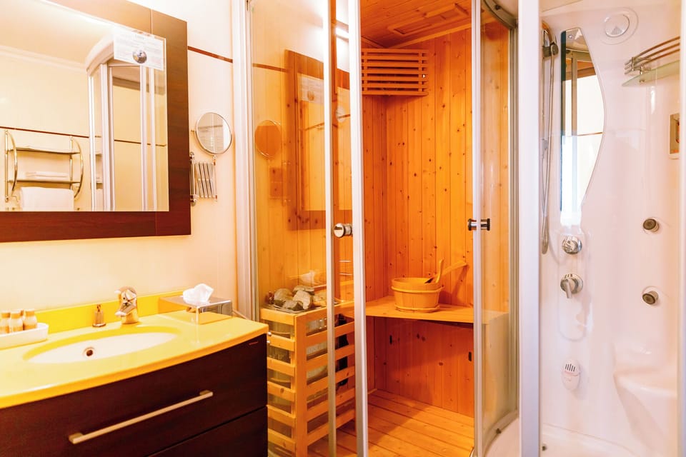 Presidential Apartment | Bathroom | Deep soaking tub, rainfall showerhead, hair dryer, bathrobes