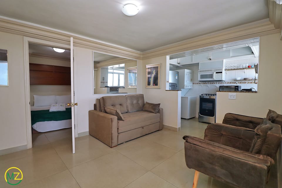 Panoramic Penthouse, 2 Bedrooms, Beach View, Beachfront | Living area | TV
