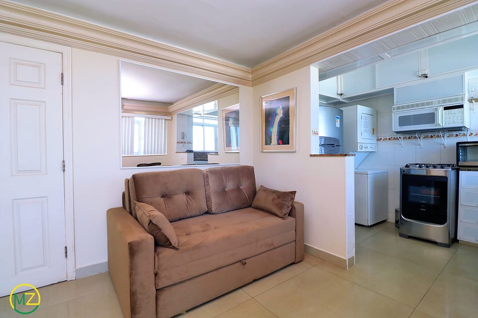 Panoramic Penthouse, 2 Bedrooms, Beach View, Beachfront | Living area | TV