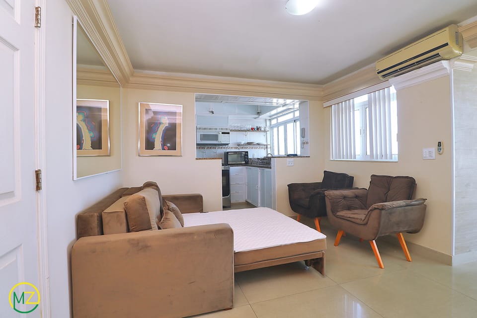 Panoramic Penthouse, 2 Bedrooms, Beach View, Beachfront | Living area | TV
