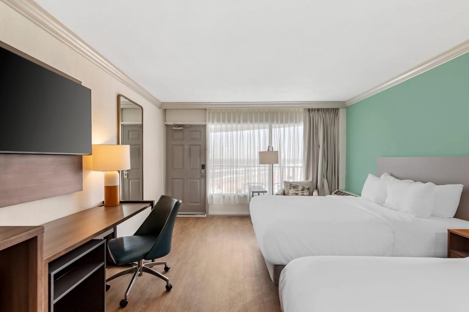 Standard Room, 2 Queen Beds, Non Smoking | Desk, laptop workspace, blackout drapes, iron/ironing board