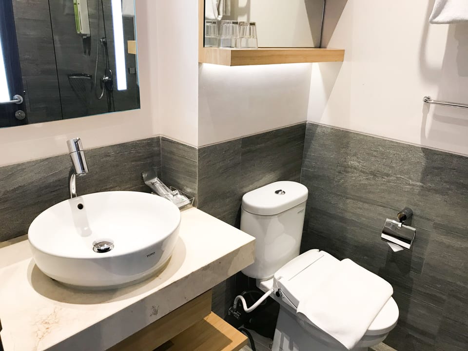 Shower, free toiletries, hair dryer, slippers