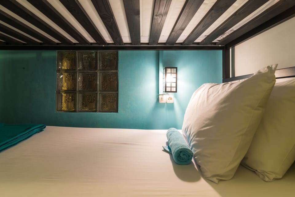 Economy Twin Room, Shared Bathroom | Blackout drapes, free WiFi, bed sheets
