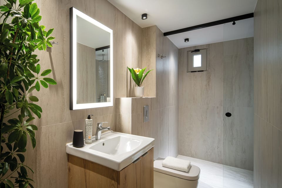 Superior Studio | Bathroom | Bathtub, deep soaking tub, hair dryer, towels