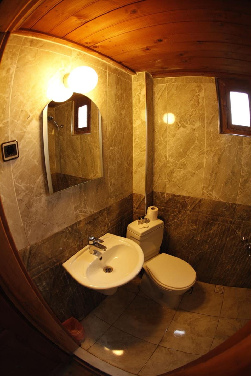 Shower, free toiletries, hair dryer, slippers