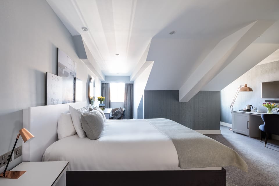 Superior Room (Loft) | Hypo-allergenic bedding, in-room safe, desk, iron/ironing board