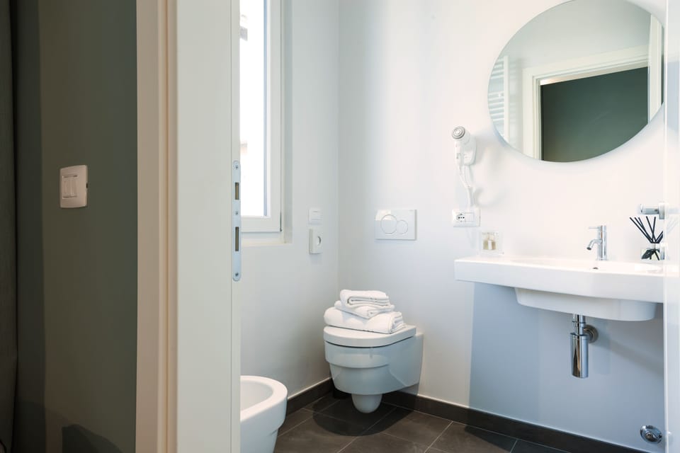 Standard Double Room Single Use, City View | Bathroom | Shower, rainfall showerhead, designer toiletries, hair dryer