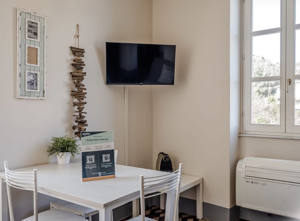 Apartment, 1 Bedroom | Living area | Flat-screen TV