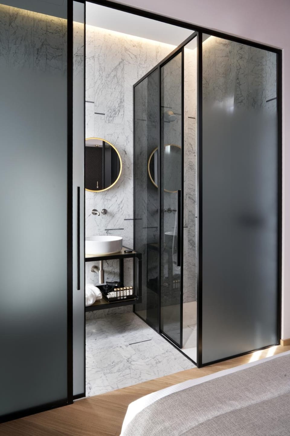 Shower, designer toiletries, hair dryer, bathrobes