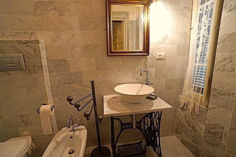 Double Room (Degna) | Bathroom | Shower, hair dryer, towels