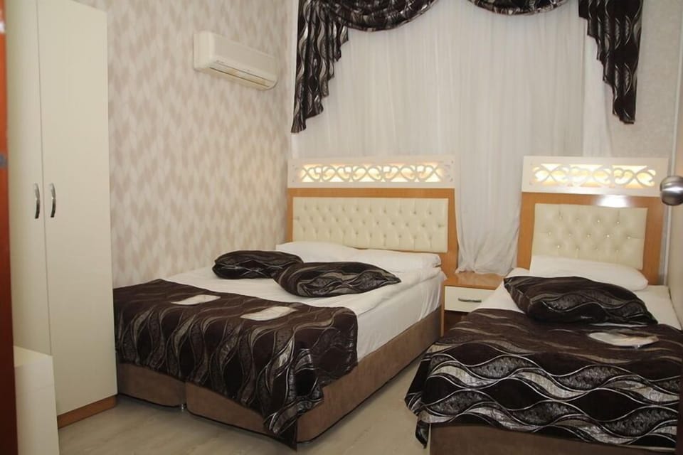 Standard Triple Room | Desk, iron/ironing board, free cribs/infant beds, free WiFi