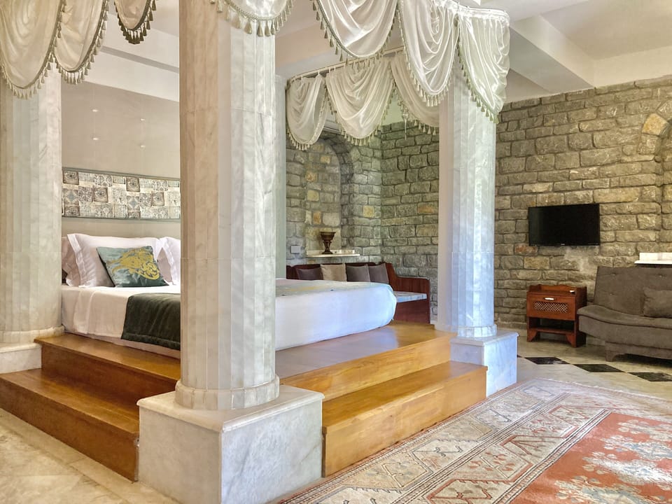 King Suite Room, Garden View | Premium bedding, free minibar items, desk, blackout drapes