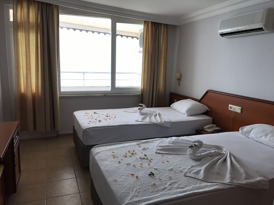 Economy Double Room, Balcony | Minibar, desk, iron/ironing board, WiFi