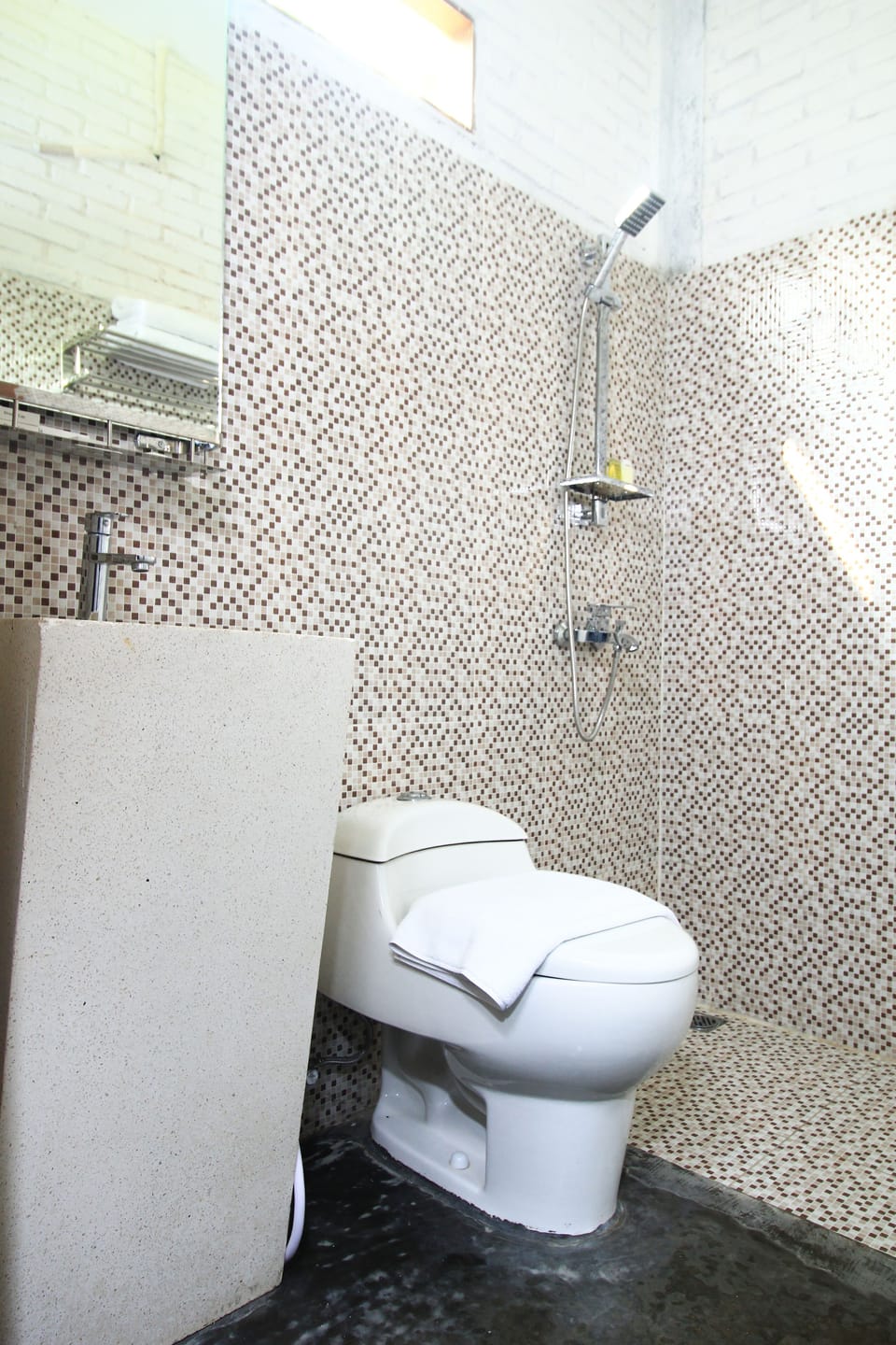 Shower, free toiletries, hair dryer, slippers