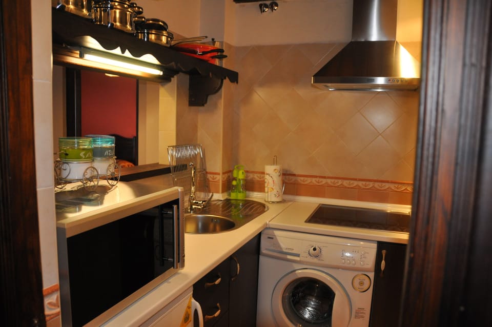 Apartment, 2 Bedrooms | Private kitchen | Fridge, microwave, stovetop, coffee/tea maker