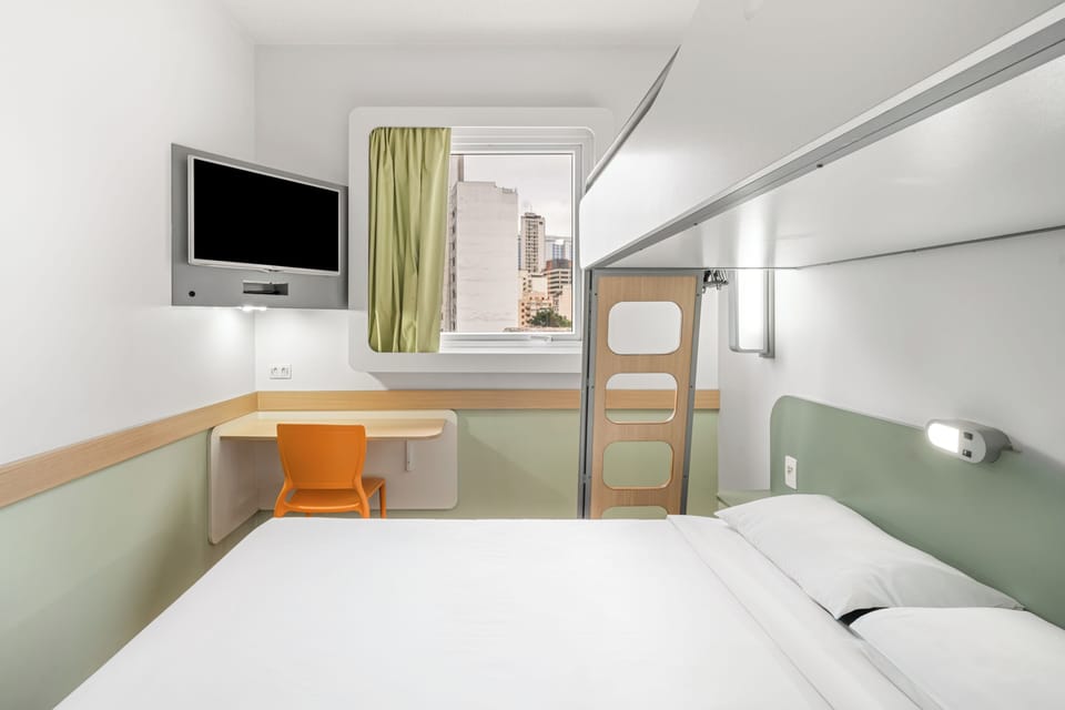 Standard Triple Room, Multiple Beds, City View | Laptop workspace, blackout drapes, WiFi (free), individually decorated