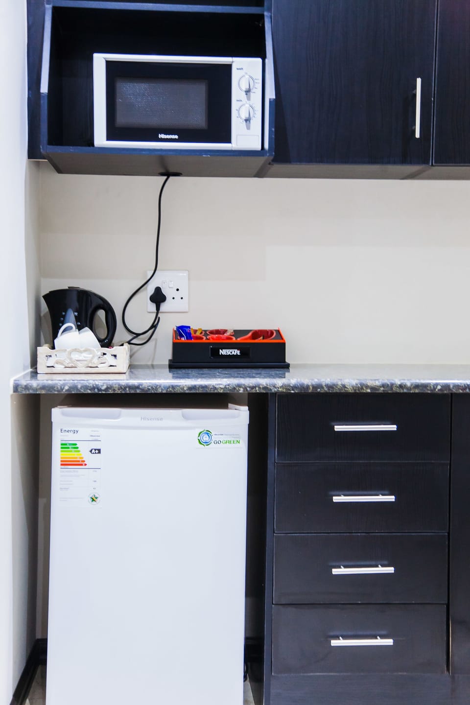 Deluxe Room, 1 Bedroom | Private kitchenette | Fridge, coffee/tea maker