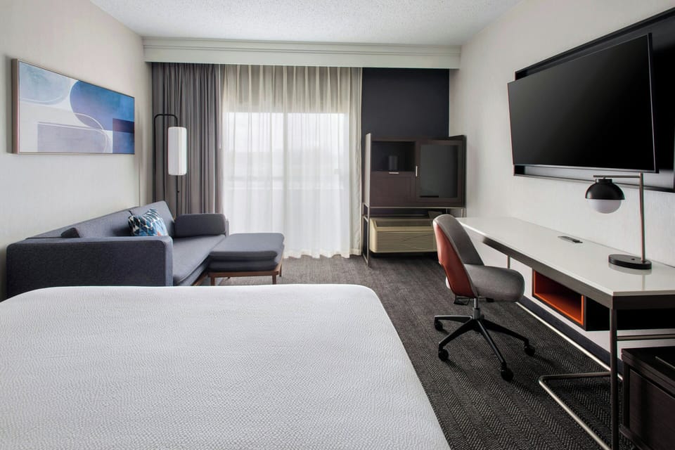 Room, 1 King Bed, Non Smoking | Desk, laptop workspace, blackout drapes, iron/ironing board