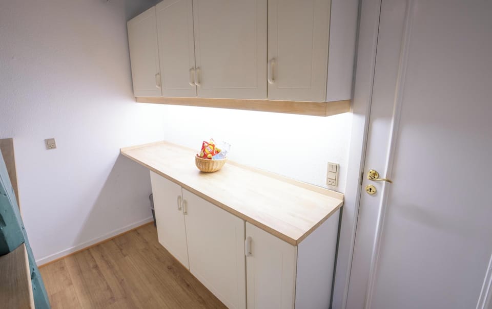 Family Apartment, 3 Bedrooms | Living area | 32-inch flat-screen TV with cable channels, TV