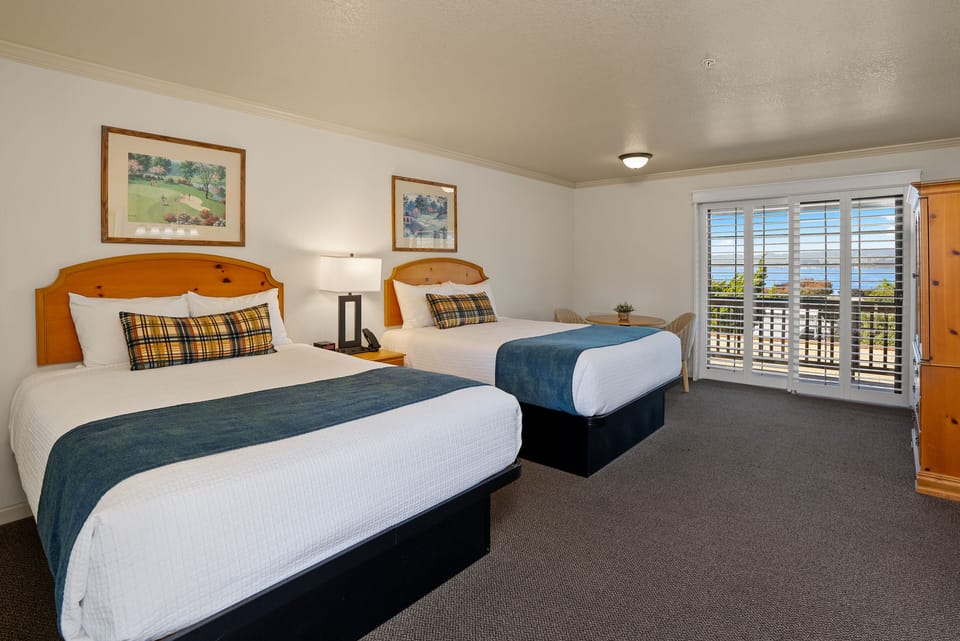 Standard Room, 2 Double Beds | Blackout drapes, iron/ironing board, bed sheets
