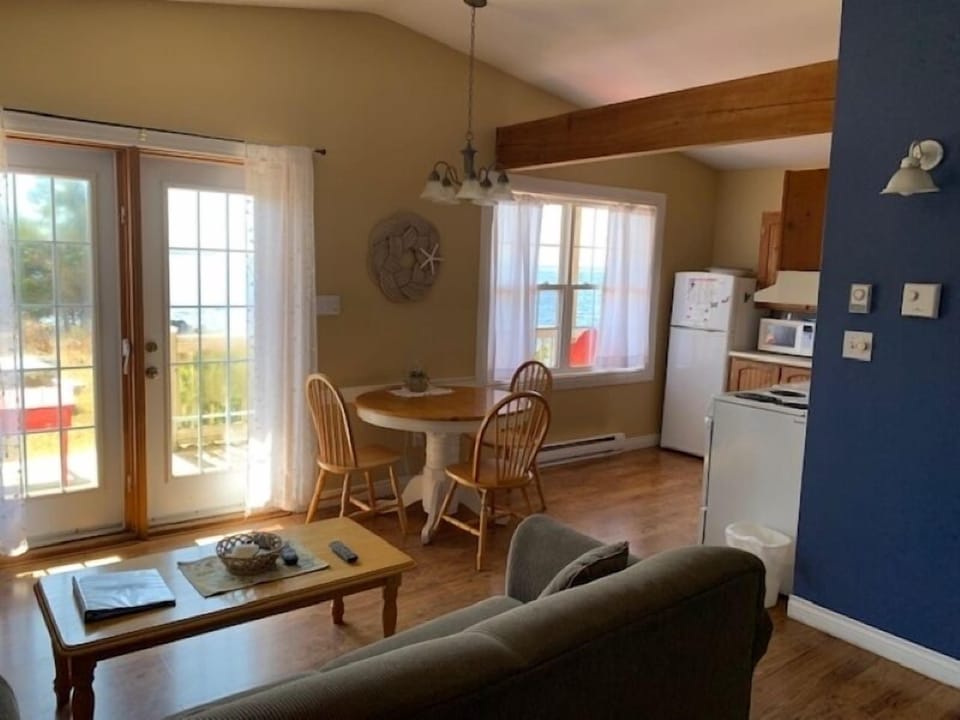 Cottage 5 - Sou'Wester | Living area | TV, fireplace