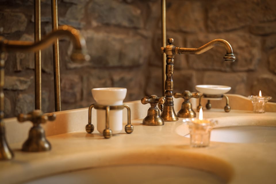 Deluxe Studio Suite (I Castagni) | Bathroom | Designer toiletries, hair dryer, bathrobes, slippers