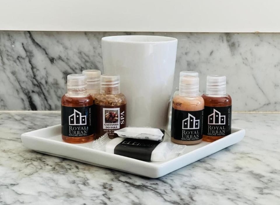 Deluxe Suite, Jetted Tub | Bathroom | Shower, designer toiletries, hair dryer, towels