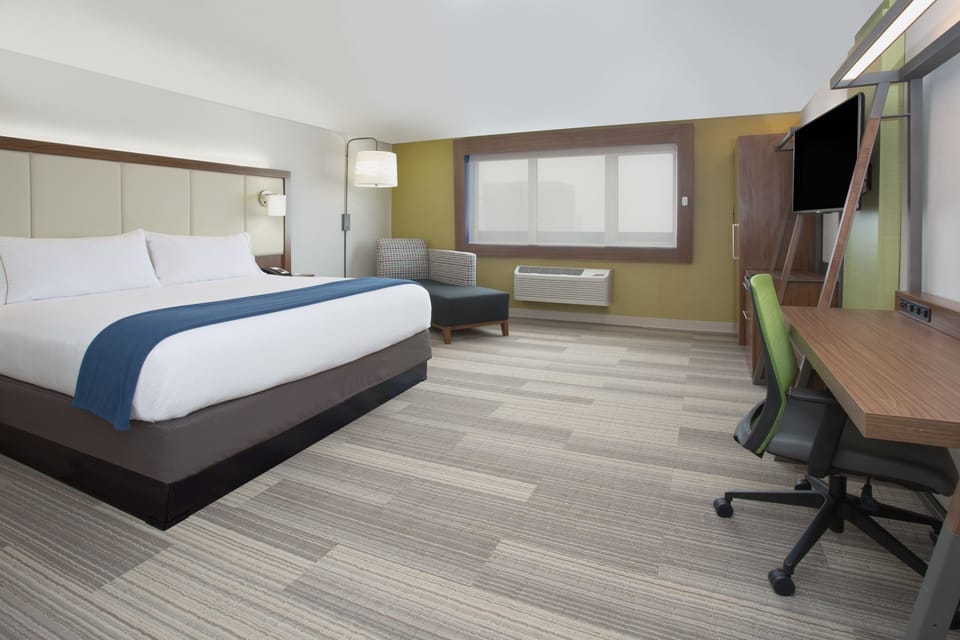 Suite, 1 Bedroom | Desk, blackout drapes, iron/ironing board, cribs (free)