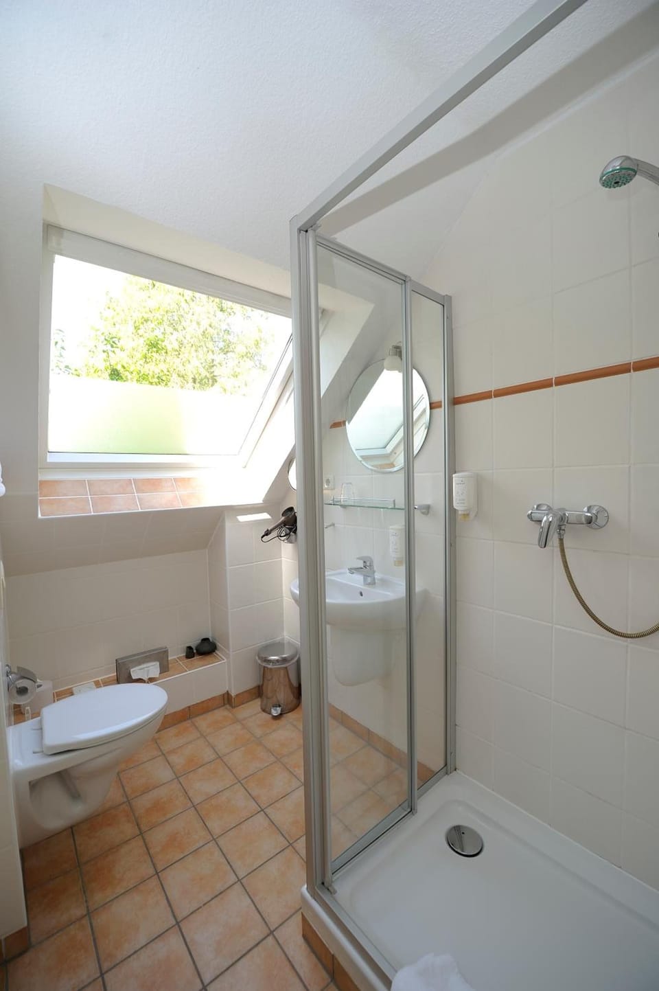 Shower, free toiletries, hair dryer, towels