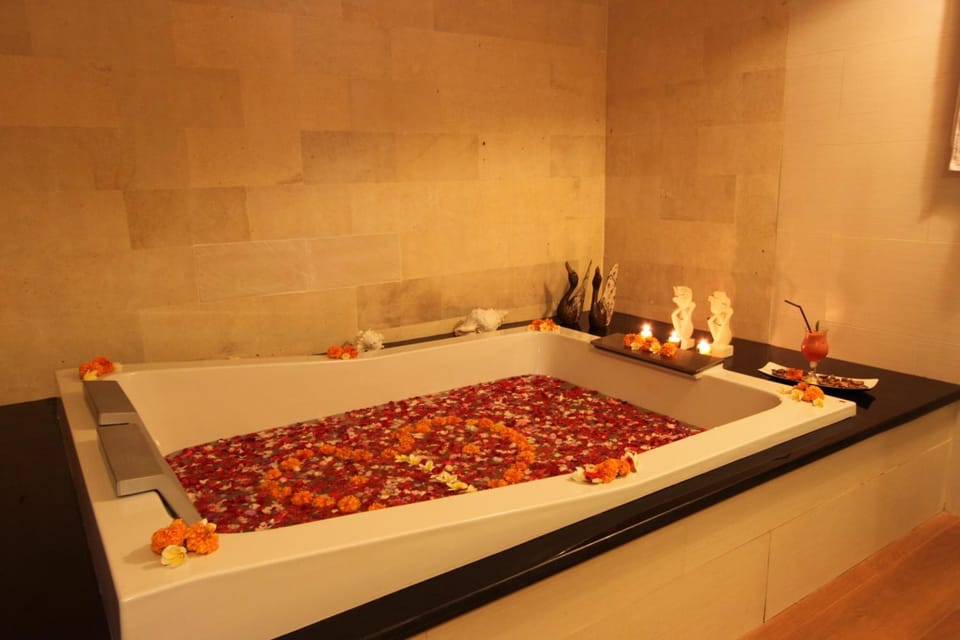 Separate tub and shower, free toiletries, slippers, towels