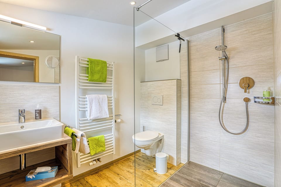 Deluxe Double Room, Balcony, Mountain View | Bathroom | Shower, free toiletries, hair dryer, towels