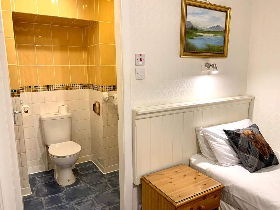 Classic Twin Room | Blackout drapes, iron/ironing board, free cribs/infant beds, free WiFi