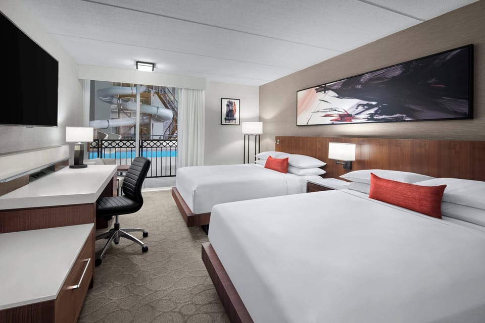 Deluxe Room, 2 Queen Beds, Pool Access, Poolside | Premium bedding, down comforters, pillowtop beds, in-room safe