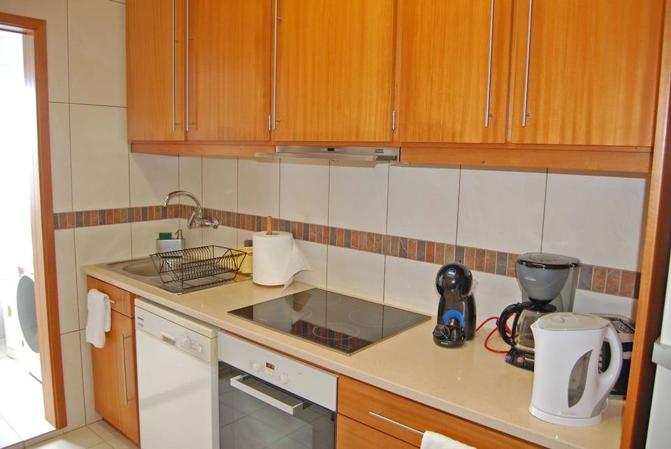 Comfort Apartment | Private kitchen | Full-size fridge, microwave, oven, stovetop