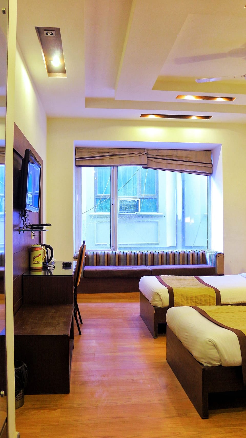 Deluxe Room, Private Bathroom | Desk, blackout drapes, soundproofing, iron/ironing board