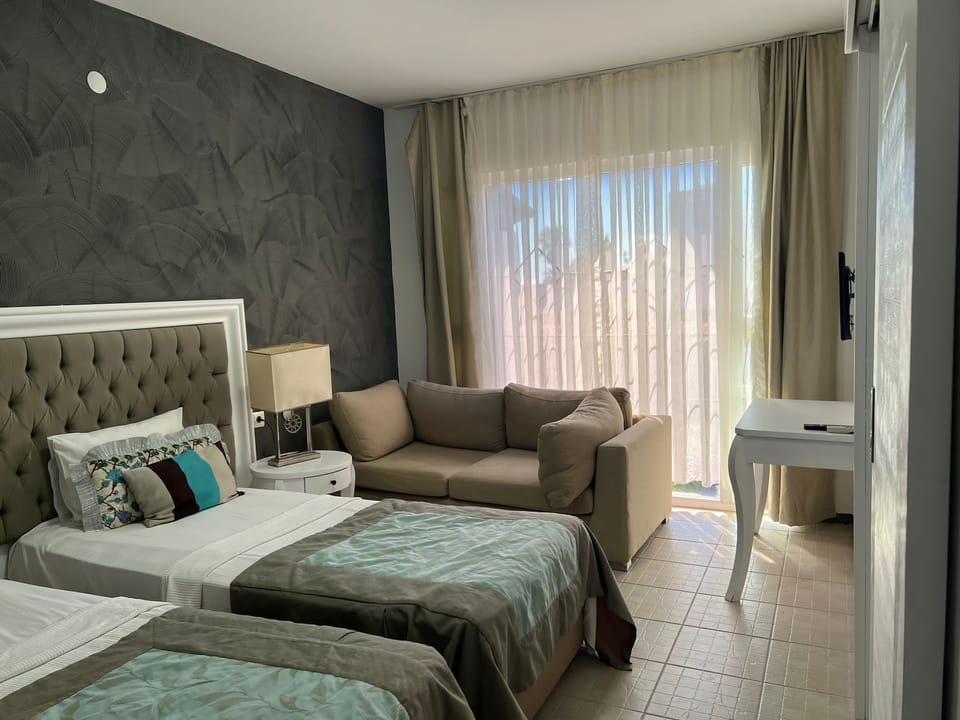 Family Room, 2 Bedrooms | Premium bedding, minibar, in-room safe, desk