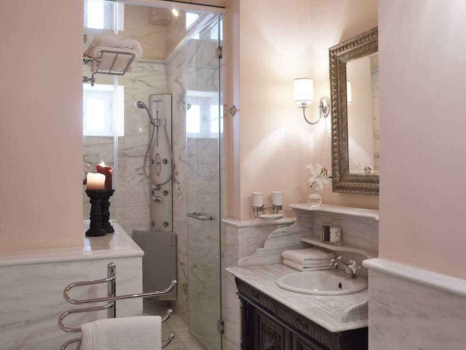 Honeymoon Double Room, City View | Bathroom | Shower, designer toiletries, hair dryer, bathrobes