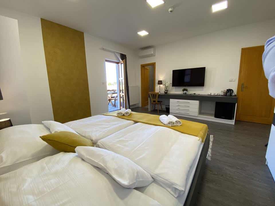 Deluxe Triple Room (7) | Premium bedding, minibar, in-room safe, individually decorated