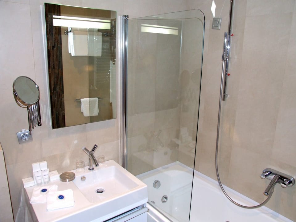 Combined shower/tub, free toiletries, hair dryer, bathrobes