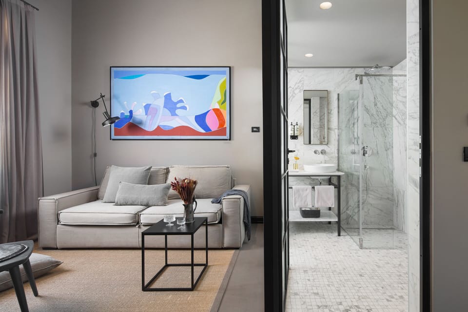 Deluxe Room, 1 King Bed with Sofa bed, Mezzanine | Living area | 65-inch Smart TV with satellite channels, TV, Netflix