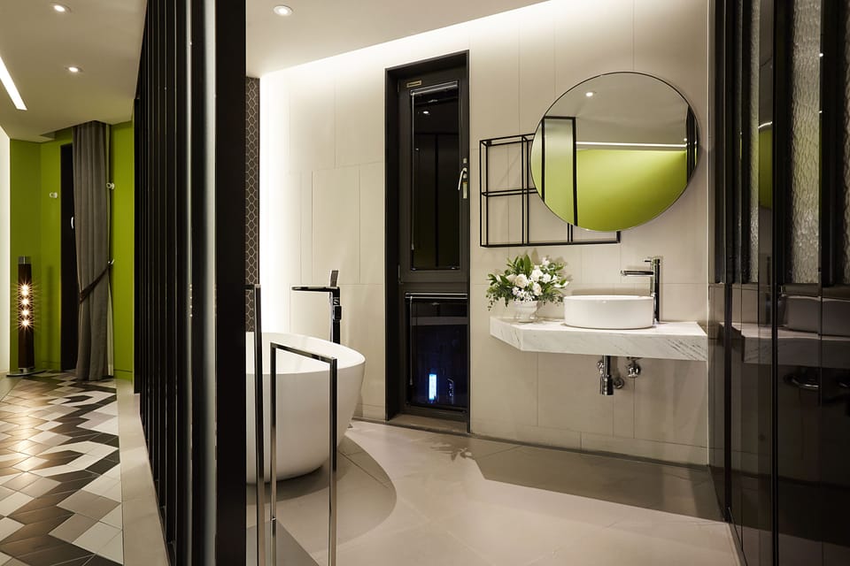 Separate tub and shower, hair dryer, bathrobes, slippers