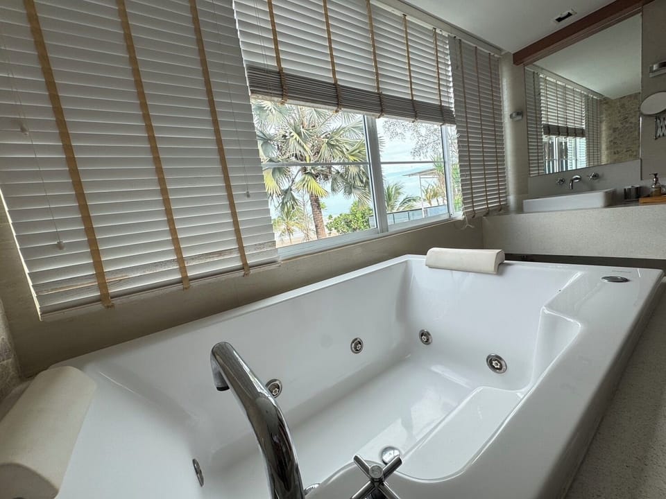202 The Supreme Suite: Beach Zone | Bathroom | Free toiletries, hair dryer, bathrobes, slippers