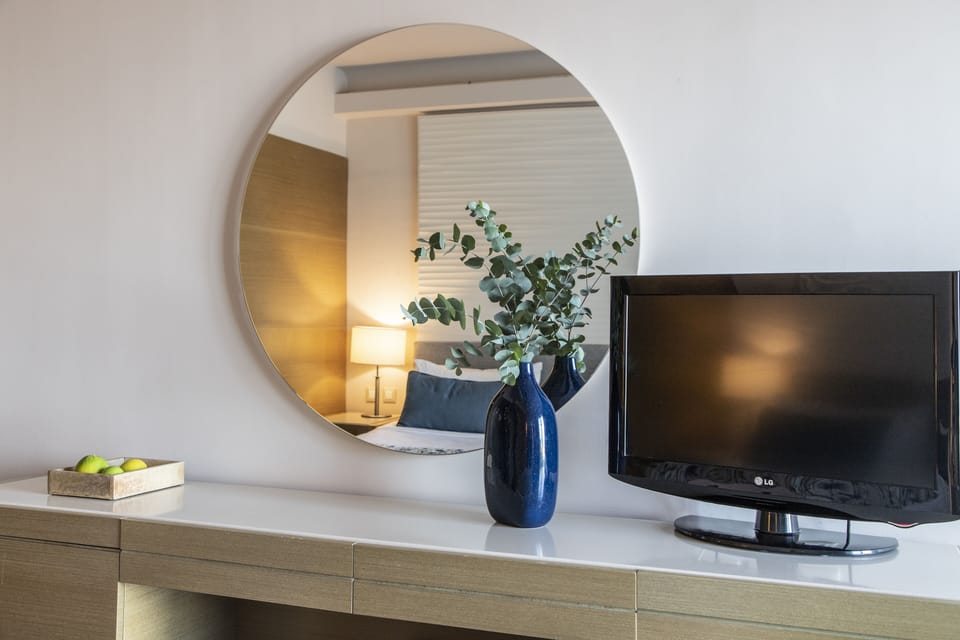Free minibar, in-room safe, blackout drapes, iron/ironing board