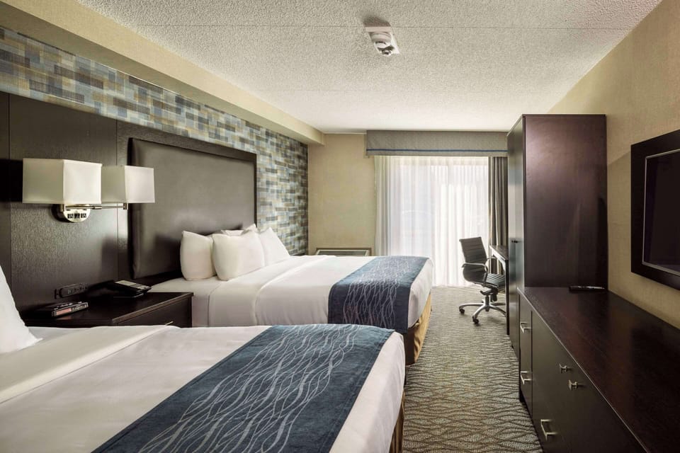 Premium bedding, pillowtop beds, desk, blackout drapes