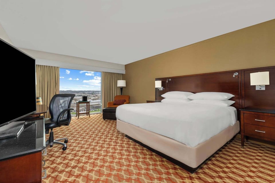 Premium bedding, down comforters, in-room safe, desk