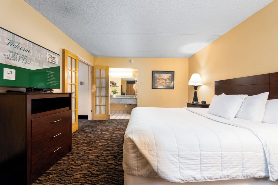 Pillowtop beds, desk, blackout drapes, iron/ironing board