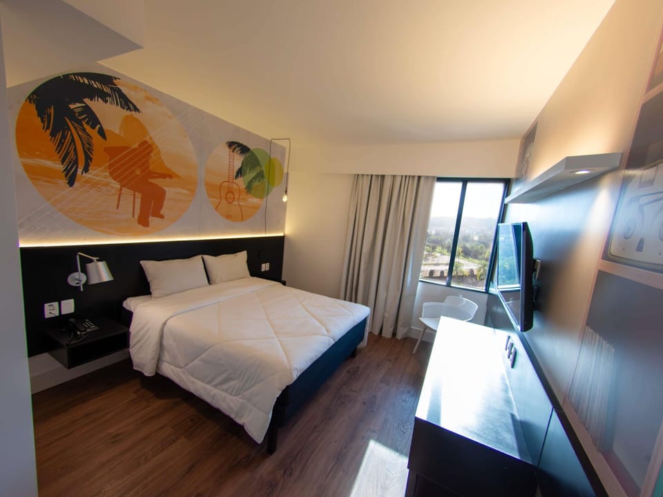 Superior Room, 1 Queen Bed | Minibar, in-room safe, individually decorated, blackout drapes